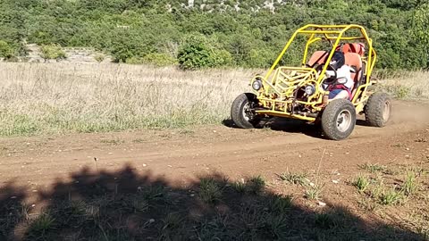 Buggy on dirt track