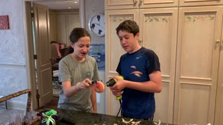 Kids hilariously peel apple with power drill