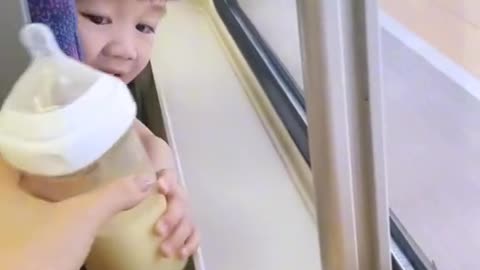 Cute japanese baby girl in a train