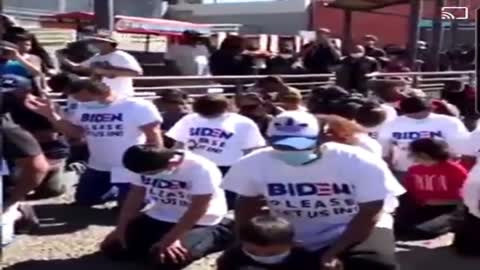 Who Is Funding This? - Illegal Immigrants Wearing "Biden Please Let Us In" Shirts For Photo Op
