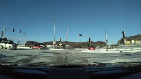 Car in a Hurry Slides Haphazardly Through Intersection