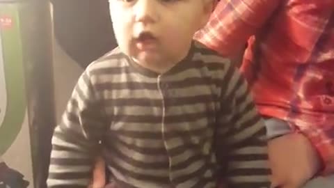 Baby on vibrating workout machine makes comical noises