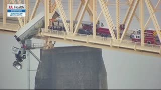 BREAKING...Trapped driver rescued from semi hanging over Louisville bridge FULL RESCUE