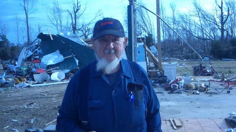 MAYFIELD KY MAN'S HOUSE SUCKED UP AROUND HIM BY TORNADO!