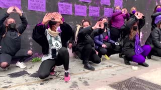 Madrid women restore vandalised feminist mural