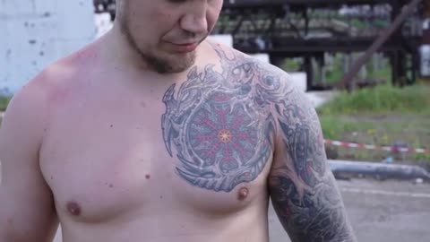Neo-Nazi tattoos on Ukrainian soldiers captured at the Azovstal factory.