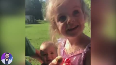 FUNNY REACTION OF BABY PLAYING CHICKEN