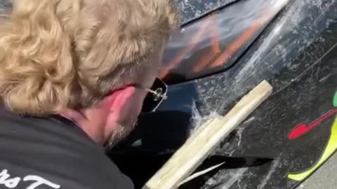 Piece of Wood breaks the Lamborghini and stuck below the headlight