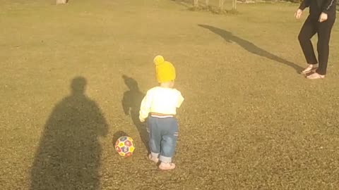 Baby play football