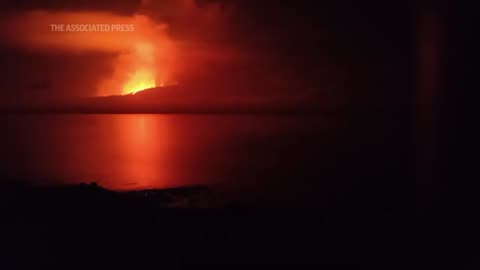 Galapagos volcano in Ecuador begins erupting