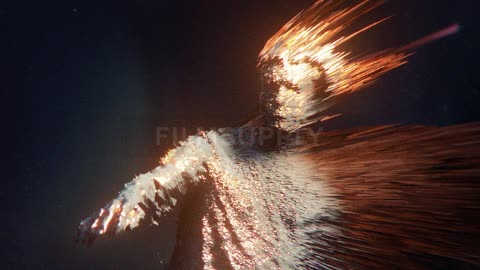 A teenager reaches his hand forward as flames come off his body