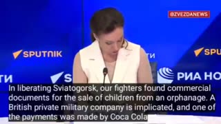 Did she just say Coca Cola is linked to child trafficking in Ukraine?