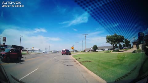 SUV Sideswipes Red Van