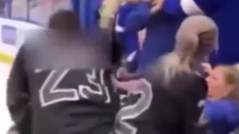 COUPLE BEAT UP A MAN AT A HOCKEY GAME