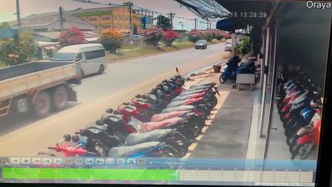 Traffic Cone Sign Protects Mopeds From Water Tank