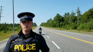 Officer hides motorcycle behind pen