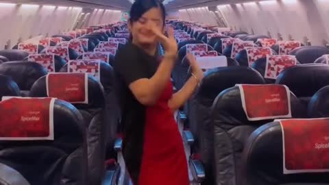 Flight Attendant dancing inside empty flight in amplifying mood!