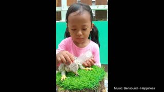 Adorable Toddler Feeds An Eagle Baby