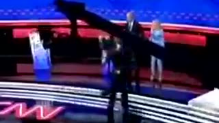 Zoomed in video of Jill Biden leading Joe off the debate stage