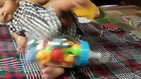 Playing baby with toys