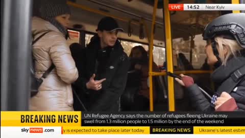 Sky news interviewing people evacuating near Kiev