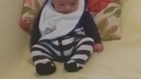 Adorable baby discovers feet for first time