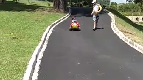 Kid Laughs Down Hill Until Stroller Hits Curb
