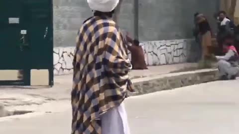 Taliban Soldiers Detaining People in the Streets of Kabul