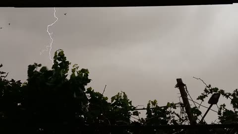 Lightning in rainy day