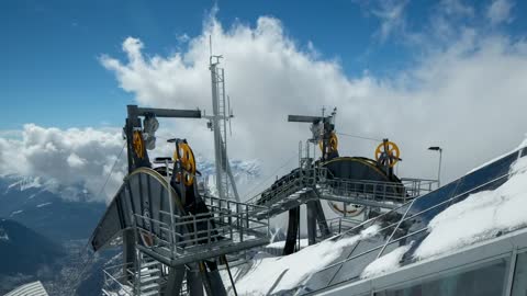 Cable car machine in the snowy mountains