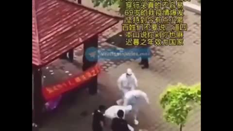 Chinese COVID Enforcer absolutely loses her mind smashing her face against a pole
