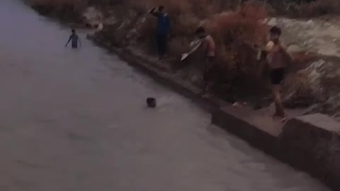 saving the child from drowning in the river