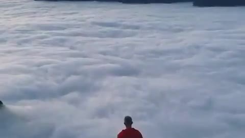 Walking Above The Clouds And Mountain Tops