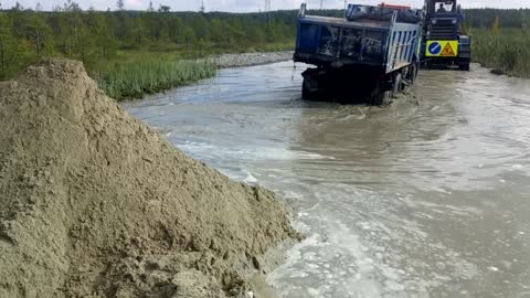 Russian KAMAZ stuck in the mud