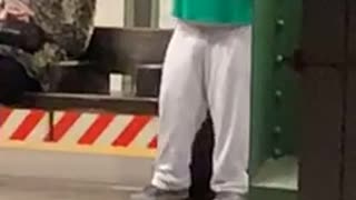 Subway rabbit man records himself singing in subway station