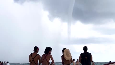 Drumming to a Waterspout