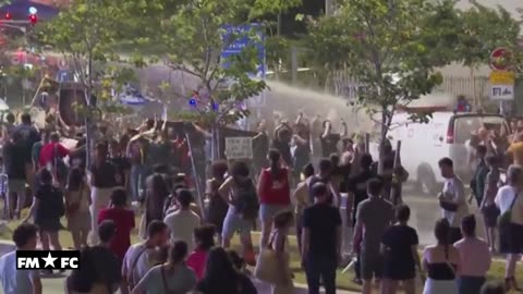 Police use water cannon to disperse anti-government protesters in Tel Aviv