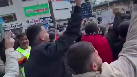 Kurdish migrants hurl abuse at Japanese citizens hold a patriotic parade in