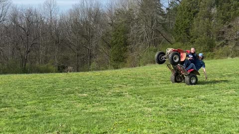 Playing football on a four wheeler