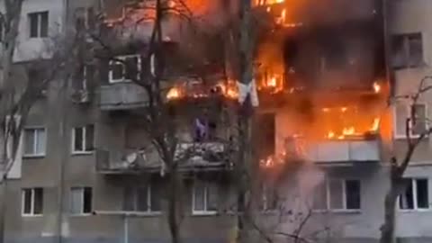 An apartment building burning after getting hit by a Russian shelling in Mykolaiv