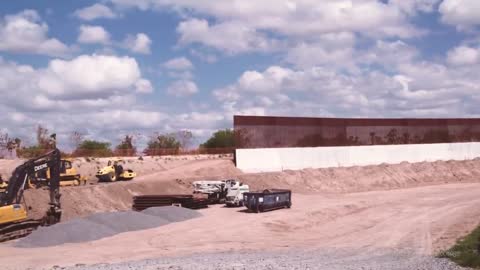 Video Shows Border Crisis as immigrants Cross the Border agent