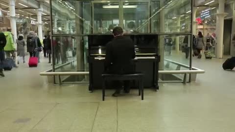 When a professional musician (Henri Herbert) sits down at a public piano