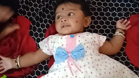 Chaarvi baby with her new dress
