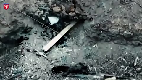 Russian Soldier Gives an Unexploded Drone a Nudge