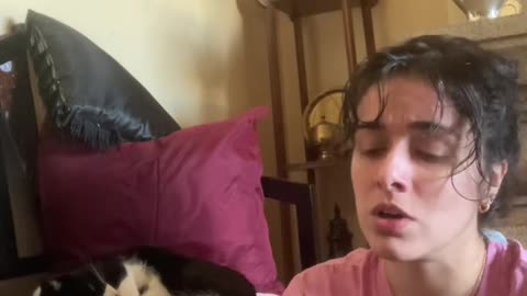 My cat's heart melting reaction to my singing (cuteness overload alert)