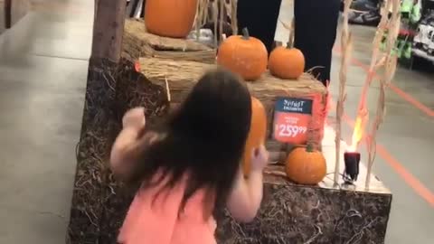 Little Girl Dances To Halloween Theme In A Spirit Store