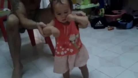 A 12 month old's first steps.