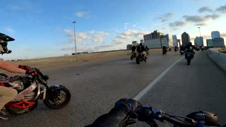 Rider Performing Wheelie Nearly Falls Off Overpass