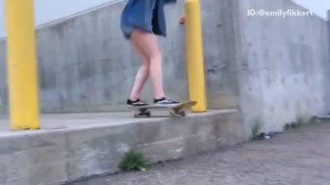 Girl in denim jacket skateboard face plant