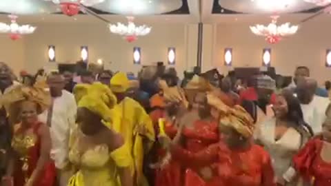 African bride dancing on her wedding day